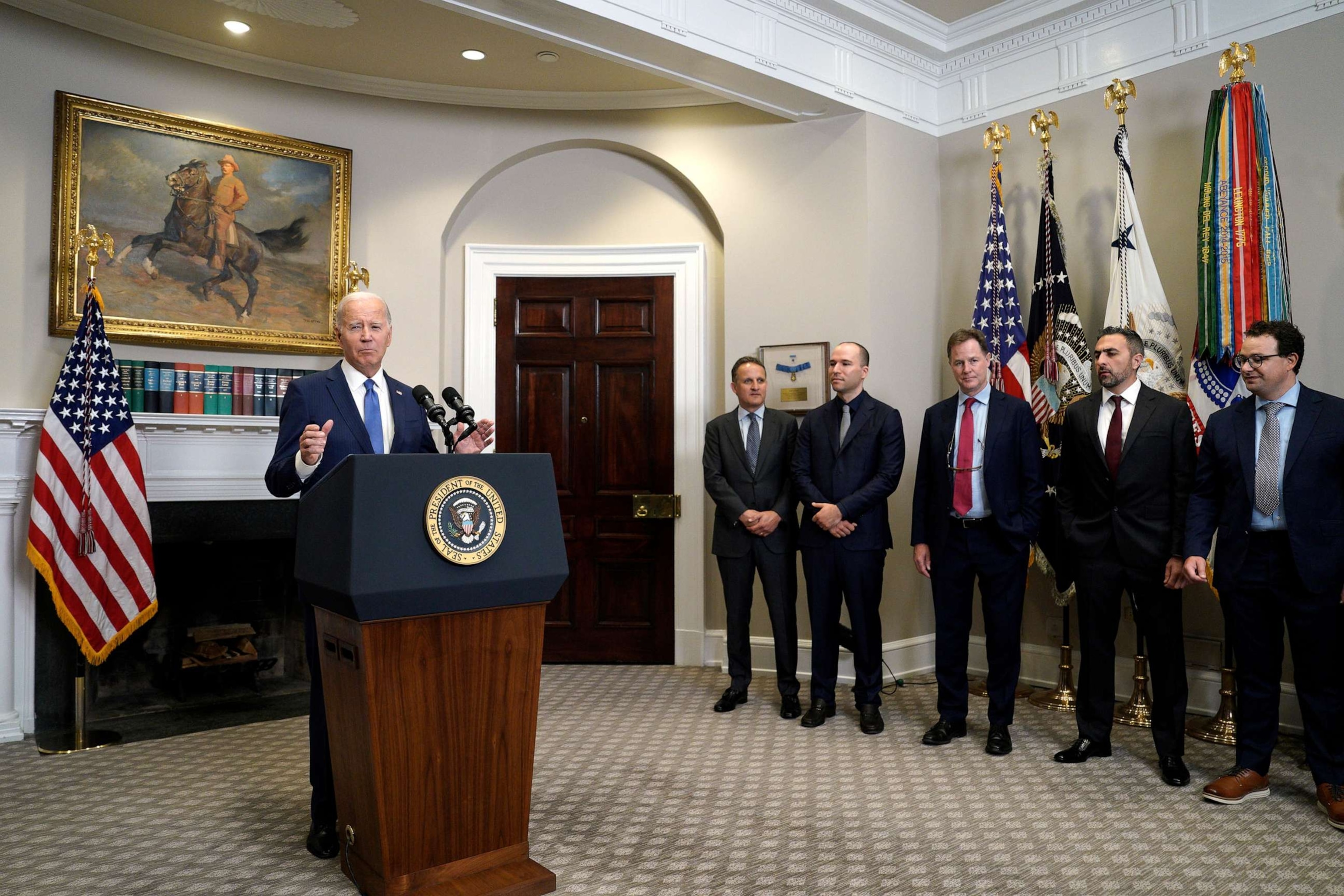 PHOTO:President Joe Biden, left, speaks in the Roosevelt Room of the White House with tech leaders, July 21, 2023.