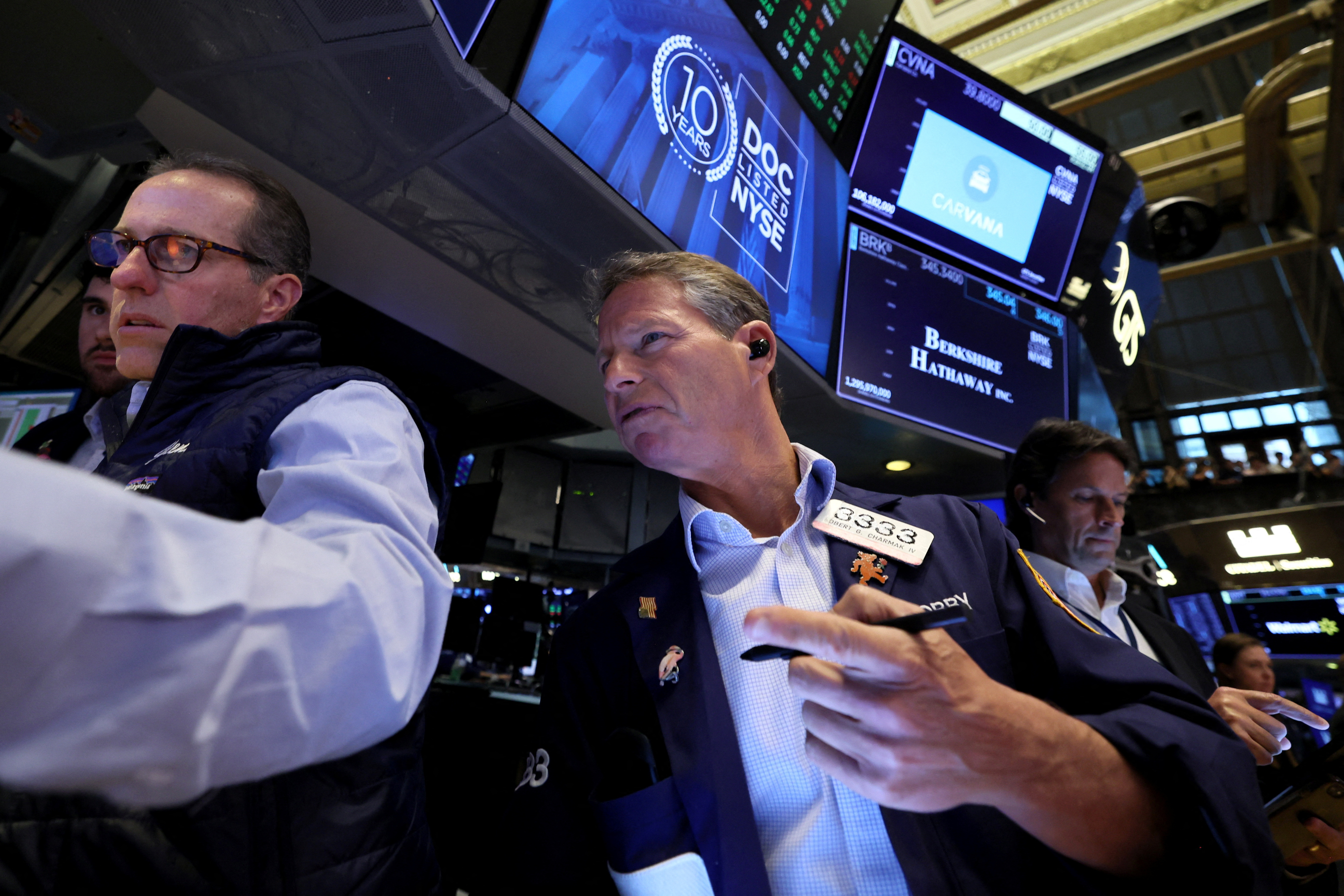 Traders work on the floor of the NYSE in New York