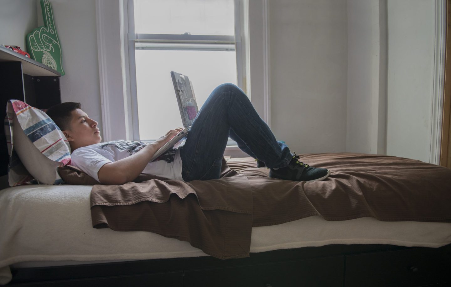 teenager with laptop